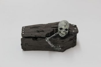 Skeleton in coffin